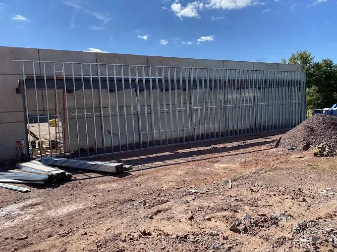 Exterior metal stud framing on a commercial building