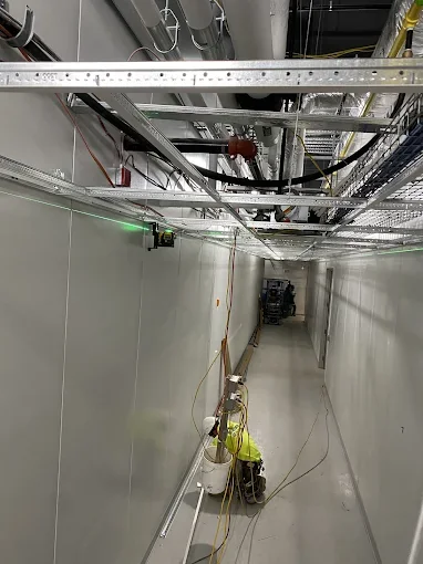 Suspended ceiling grid installed in a corridor